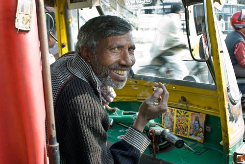 http://whatsupwithsara.files.wordpress.com/2012/02/auto-rickshaw-driver-in-delhi.jpg